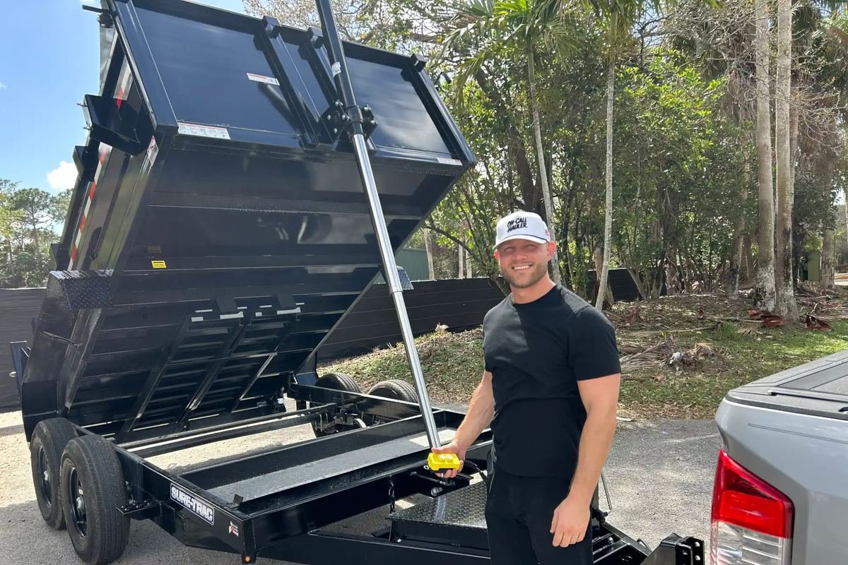 Tyler of On-Call Hauler with the 7x12 dump trailer and truck in Royal Palm Beach, Florida